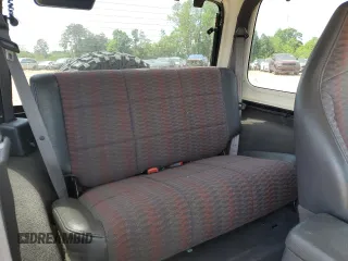 1999 Jeep Wrangler Sport with VIN 1J4FY19S9XP423684, listed as a Copart auction lot 55079455 with 149,756 mi miles and Salvage Title. Bid and sale history available at carsss.com. Image 10.