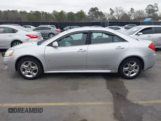 2009 Pontiac G6 1SB z VIN 1G2ZJ57B994252266, wystawiony jako IAAI lot #41609938 z przebiegiem 162 412 mil mil oraz . Historia ofert i sprzedaży dostępna na DreamBid. Obrazek 14.