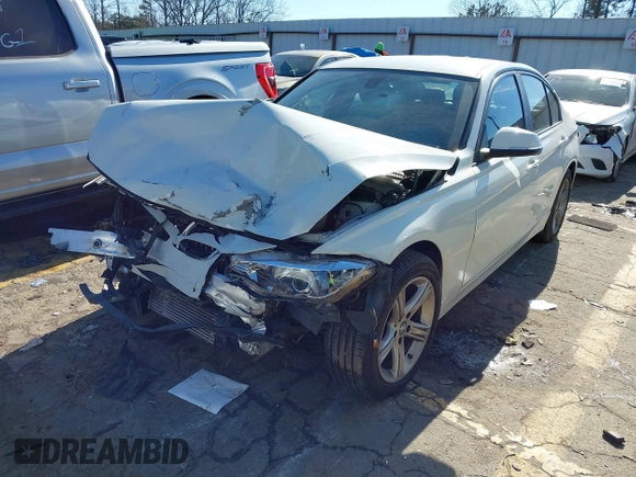 2013 BMW 3 Series 320i with VIN WBA3B1C56DF462549, listed as a IAAI auction lot 41411287 with 119,146 mi miles. Bid and sale history available at carsss.com. Image 2.