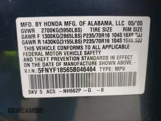 2005 Honda Pilot EX-L with VIN 5FNYF18565B046464, listed as a IAAI auction lot 41879495 with 228,021 mi miles. Bid and sale history available at carsss.com. Image 9.