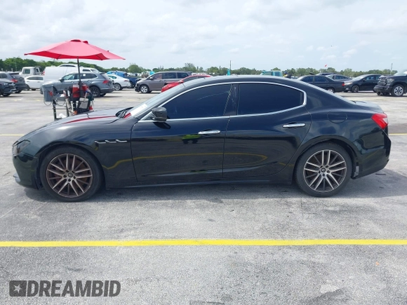 2015 Maserati Ghibli with VIN ZAM57XSA1F1144073, listed as a IAAI auction lot 42770723 with 105,782 mi miles and . Bid and sale history available at DreamBid. Image 14.