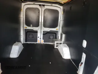 2016 Ford Transit Cargo z VIN 1FTYR2CM5GKB15310, wystawiony jako Copart lot #59266185 z przebiegiem 64 352 mil mil oraz Tytuł czysty. Historia ofert i sprzedaży dostępna na DreamBid. Obrazek 10.