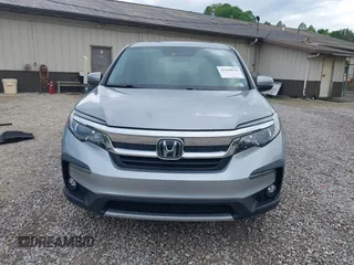 2021 Honda Pilot EX-L with VIN 5FNYF6H50MB063465, listed as a IAAI auction lot 42160636 with 28,595 mi miles and . Bid and sale history available at DreamBid. Image 12.