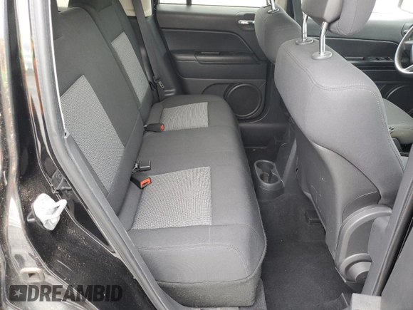 2010 Jeep Patriot Sport z VIN 1J4NF2GB4AD512307, wystawiony jako Copart lot #57686005 z przebiegiem 92 884 mil mil oraz Czysty tytuł • Clean title. Historia ofert i sprzedaży dostępna na DreamBid. Obrazek 11.