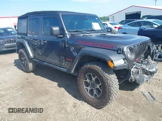 2021 Jeep Wrangler Unlimited Rubicon z VIN 1C4HJXFN5MW509483, wystawiony jako IAAI lot #42245703 z przebiegiem 59 461 mil mil oraz . Historia ofert i sprzedaży dostępna na DreamBid. Obrazek 1.
