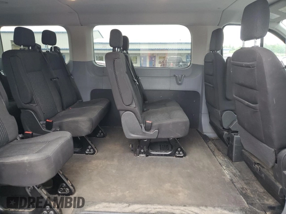 2018 Ford Transit Passenger XL z VIN 1FMZK1ZM3JKA12688, wystawiony jako Copart lot #60635335 z przebiegiem 121 509 mil mil oraz Szkoda całkowita • Salvage title. Historia ofert i sprzedaży dostępna na DreamBid. Obrazek 11.