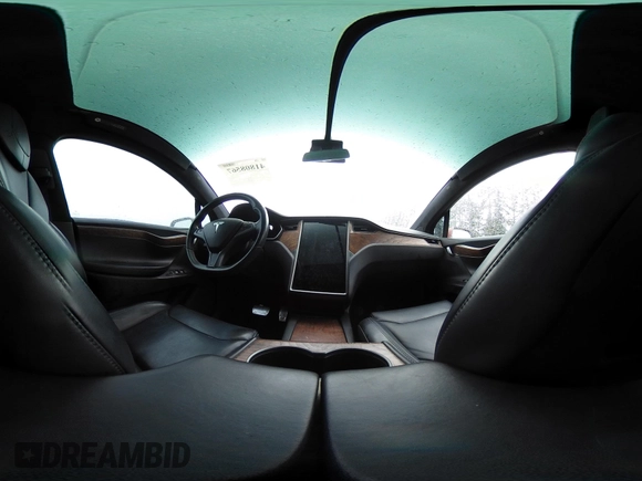 2019 Tesla Model X 75D with VIN 5YJXCBE23KF207739, listed as a IAAI auction lot 41808567 with 191,233 mi miles and . Bid and sale history available at DreamBid. Image 21.