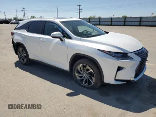 2019 Lexus RX 350L Premium with VIN JTJDZKCA2K2016146, listed as a Copart auction lot 52820245 with 88,401 mi miles and Salvage title. Bid and sale history available at DreamBid. Image 4.