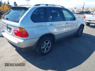 2002 BMW X5 3.0i with VIN 5UXFA53552LV70703, listed as a IAAI auction lot 41957874 with 144,369 mi miles. Bid and sale history available at carsss.com. Image 4.