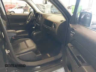 2014 Jeep Patriot Limited with VIN 1C4NJRCB4ED629085, listed as a IAAI auction lot 39414215 with 87,409 mi miles. Bid and sale history available at carsss.com. Image 5.