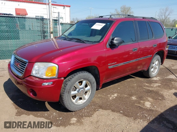 2006 GMC Envoy SLT with VIN 1GKDT13S662189377, listed as a IAAI auction lot 42106602 with 156,391 mi miles and . Bid and sale history available at DreamBid. Image 2.