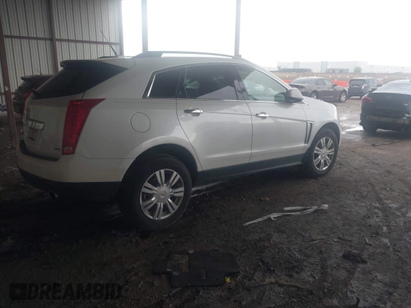 2014 Cadillac SRX z VIN 3GYFNAE32ES580480, wystawiony jako IAAI lot #42170765 z przebiegiem 148 245 mil mil oraz . Historia ofert i sprzedaży dostępna na DreamBid. Obrazek 4.
