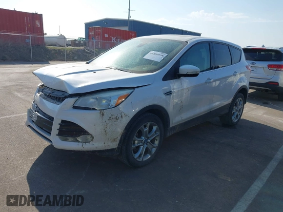 2013 Ford Escape SEL with VIN 1FMCU9H97DUD25280, listed as a IAAI auction lot 41880958 with 132,003 mi miles and . Bid and sale history available at DreamBid. Image 2.