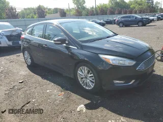 2017 Ford Focus Titanium with VIN 1FADP3N2XHL207729, listed as a Copart auction lot 59184855 with 146,768 mi miles and Salvage title. Bid and sale history available at DreamBid. Image 4.