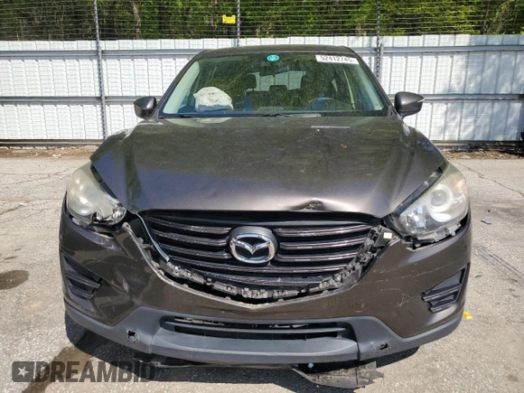 2016 Mazda CX-5 Sport with VIN JM3KE4BY4G0805179, listed as a Copart auction lot 52412745 with 85,928 mi miles and Salvage Title. Bid and sale history available at carsss.com. Image 5.