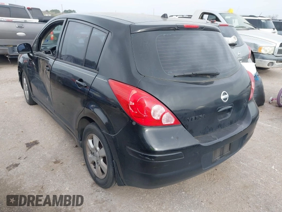 2009 Nissan Versa 1.8 SL with VIN 3N1BC13E59L496882, listed as a IAAI auction lot 41798734 with 210,907 mi miles. Bid and sale history available at carsss.com. Image 3.