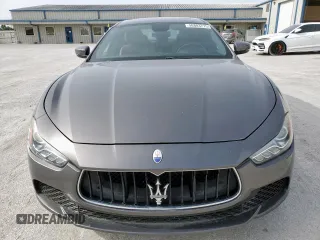 2017 Maserati Ghibli z VIN ZAM57XSA9H1206127, wystawiony jako Copart lot #56883775 z przebiegiem 13 439 mil mil oraz Czysty tytuł • Clean title. Historia ofert i sprzedaży dostępna na DreamBid. Obrazek 5.