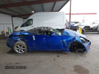 2005 Nissan 350Z Touring with VIN JN1AZ36A45M753058, listed as a IAAI auction lot 41563023 with 1 mi miles. Bid and sale history available at carsss.com. Image 13.