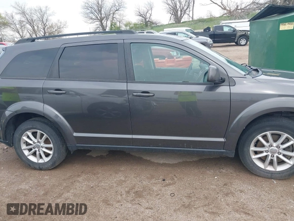 2017 Dodge Journey SXT z VIN 3C4PDDBG0HT540757, wystawiony jako IAAI lot #42104065 z przebiegiem 116 059 mil mil oraz . Historia ofert i sprzedaży dostępna na DreamBid. Obrazek 13.