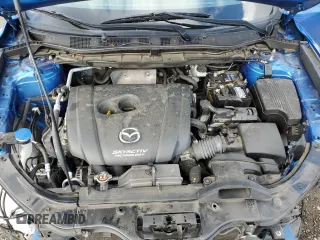 2014 Mazda CX-5 Touring with VIN JM3KE4CY3E0381134, listed as a Copart auction lot 52115015 with 52,162 mi miles and Salvage Title. Bid and sale history available at carsss.com. Image 12.