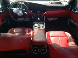 2019 Alfa Romeo Giulia z VIN ZARFAMANXK7620606, wystawiony jako Copart lot #50732025 z przebiegiem Nie podano mil oraz Szkody całkowita. Historia ofert i sprzedaży dostępna na DreamBid. Obrazek 8.