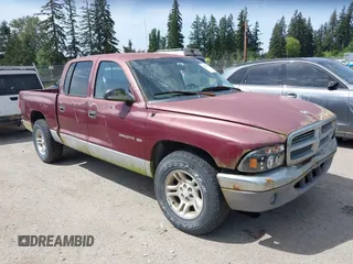 2001 Dodge Dakota z VIN 1B7HL2AX01S278971, wystawiony jako IAAI lot #42209472 z przebiegiem 254 205 mil mil oraz . Historia ofert i sprzedaży dostępna na DreamBid. Obrazek 1.