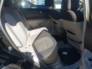 2013 Nissan Rogue S with VIN JN8AS5MV1DW600390, listed as a IAAI auction lot 41617632 with 106,584 mi miles and . Bid and sale history available at DreamBid. Image 8.