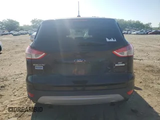 2013 Ford Escape SE with VIN 1FMCU0GX1DUB91314, listed as a Copart auction lot 56740905 with 94,861 mi miles and Clean Title. Bid and sale history available at DreamBid. Image 6.