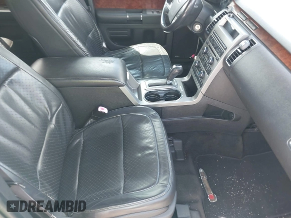 2009 Ford Flex Limited with VIN 2FMDK53C49BA12299, listed as a IAAI auction lot 41987516 with 201,665 mi miles. Bid and sale history available at carsss.com. Image 5.