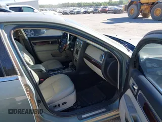 2008 Lincoln MKZ z VIN 3LNHM26T08R643850, wystawiony jako IAAI lot #42220020 z przebiegiem 170 496 mil mil oraz . Historia ofert i sprzedaży dostępna na DreamBid. Obrazek 5.