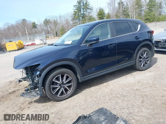 2018 Mazda CX-5 Touring z VIN JM3KFBCM4J0379871, wystawiony jako IAAI lot #41865130 z przebiegiem 48 674 mil mil oraz . Historia ofert i sprzedaży dostępna na DreamBid. Obrazek 18.