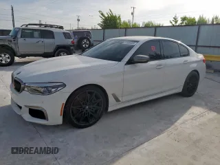 2019 BMW 5 Series M550i xDrive with VIN WBAJB9C54KB289057, listed as a Copart auction lot 61588055 with 45,055 mi miles and Salvage title. Bid and sale history available at DreamBid. Image 1.