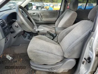 2001 Isuzu Rodeo S with VIN 4S2CK58W114317183, listed as a Copart auction lot 76280974 with 318,201 mi miles and Non Repairable. Bid and sale history available at DreamBid. Image 7.