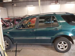 1998 Mercedes-Benz M-Class with VIN 4JGAB54E1WA011086, listed as a IAAI auction lot 41534717 with 186,273 mi miles. Bid and sale history available at carsss.com. Image 14.