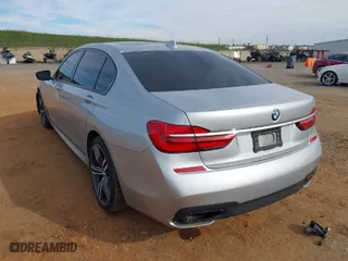 2019 BMW 7 Series 740i with VIN WBA7E2C57KB216466, listed as a IAAI auction lot 41689258 with 79962 miles. Bid and sale history available at carsss.com. Image 3.