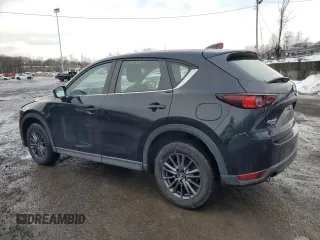 2019 Mazda CX-5 Sport with VIN JM3KFBBM7K0633737, listed as a Copart auction lot 45170645 with 76,023 mi miles and Salvage Title. Bid and sale history available at DreamBid. Image 2.