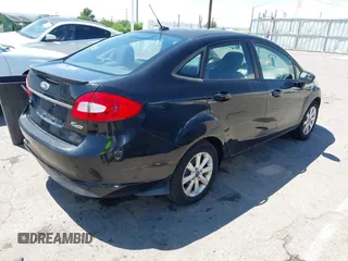 2011 Ford Fiesta SE z VIN 3FADP4BJ6BM121924, wystawiony jako IAAI lot #42453787 z przebiegiem 153 691 mil mil oraz . Historia ofert i sprzedaży dostępna na DreamBid. Obrazek 4.