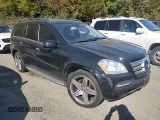 2011 Mercedes-Benz GL-Class GL 550 with VIN 4JGBF8GE2BA696439, listed as a Copart auction lot 74685374 with 56,766 mi miles and Salvage Title. Bid and sale history available at carsss.com. Image 4.