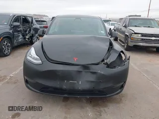 2021 Tesla Model Y Long Range with VIN 5YJYGDEE5MF111774, listed as a IAAI auction lot 41525622 with 39,960 mi miles. Bid and sale history available at carsss.com. Image 12.