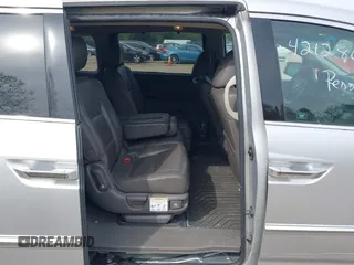2012 Honda Odyssey Touring with VIN 5FNRL5H92CB055473, listed as a IAAI auction lot 42128601 with 163,901 mi miles. Bid and sale history available at carsss.com. Image 8.