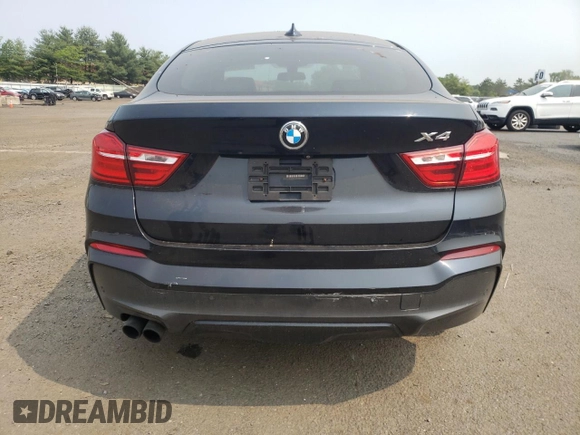 2015 BMW X4 xDrive35i with VIN 5UXXW5C59F0E87517, listed as a Copart auction lot 59604445 with 185,064 mi miles and Salvage title. Bid and sale history available at DreamBid. Image 6.