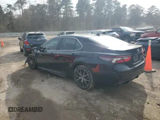 2023 Toyota Camry SE with VIN 4T1G11AK2PU735630, listed as a Copart auction lot 47280475 with 61,180 mi miles and Salvage Title. Bid and sale history available at DreamBid. Image 2.