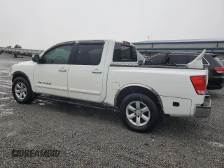 2010 Nissan Titan SE with VIN 1N6BA0ED7AN324632, listed as a Copart auction lot 57095185 with 156,391 mi miles and Salvage title. Bid and sale history available at DreamBid. Image 2.