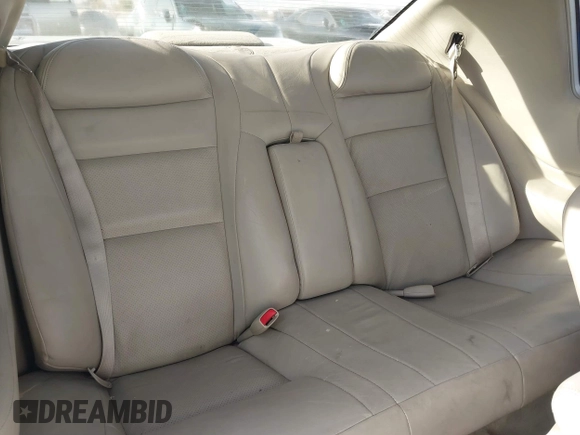 2001 Cadillac Eldorado Touring ETC z VIN 1G6ET12991B104624, wystawiony jako IAAI lot #41616324 z przebiegiem Nie podano mil oraz . Historia ofert i sprzedaży dostępna na DreamBid. Obrazek 8.