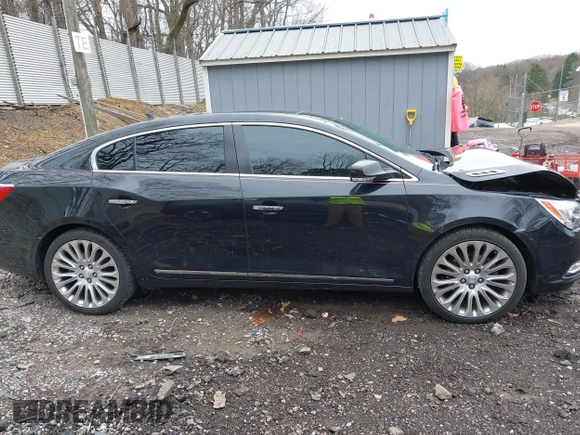 2014 Buick LaCrosse Premium II with VIN 1G4GF5G39EF172201, listed as a IAAI auction lot 41963281 with 106,231 mi miles and . Bid and sale history available at DreamBid. Image 13.