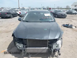 2015 Volvo S60 T5 Premier with VIN YV1612TB5F1310965, listed as a IAAI auction lot 42069463 with 107,178 mi miles. Bid and sale history available at carsss.com. Image 13.