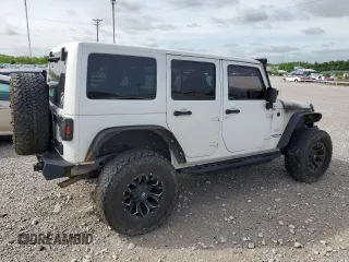 2014 Jeep Wrangler Unlimited Sahara z VIN 1C4BJWEG9EL102336, wystawiony jako Copart lot #55391335 z przebiegiem Nie podano mil oraz Szkoda całkowita • Salvage title. Historia ofert i sprzedaży dostępna na DreamBid. Obrazek 3.