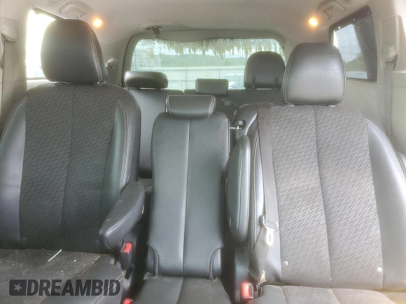 2013 Toyota Sienna SE с VIN 5TDXK3DC2DS367001, выставлен на аукционе Copart как лот 55975875 с пробегом 151 865 миль миль и Списание • Salvage title. История ставок и продаж доступна на DreamBid. Изображение 10.