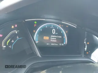 2020 Honda Civic LX with VIN 2HGFC2F61LH568767, listed as a IAAI auction lot 41909755 with 56,213 mi miles and . Bid and sale history available at DreamBid. Image 7.
