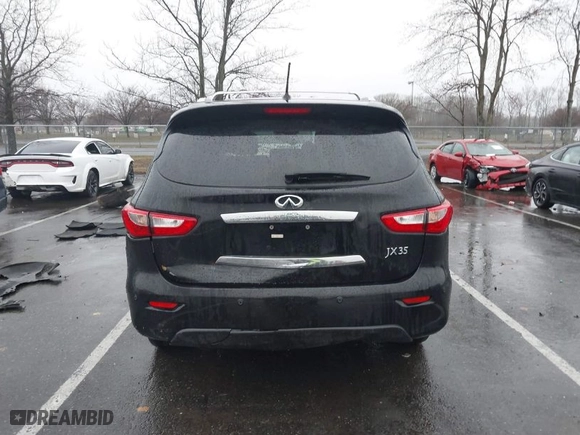 2013 Infiniti JX35 with VIN 5N1AL0MMXDC334321, listed as a IAAI auction lot 41797907 with NaN miles. Bid and sale history available at carsss.com. Image 16.